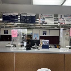 US Post Office - 1 person working.