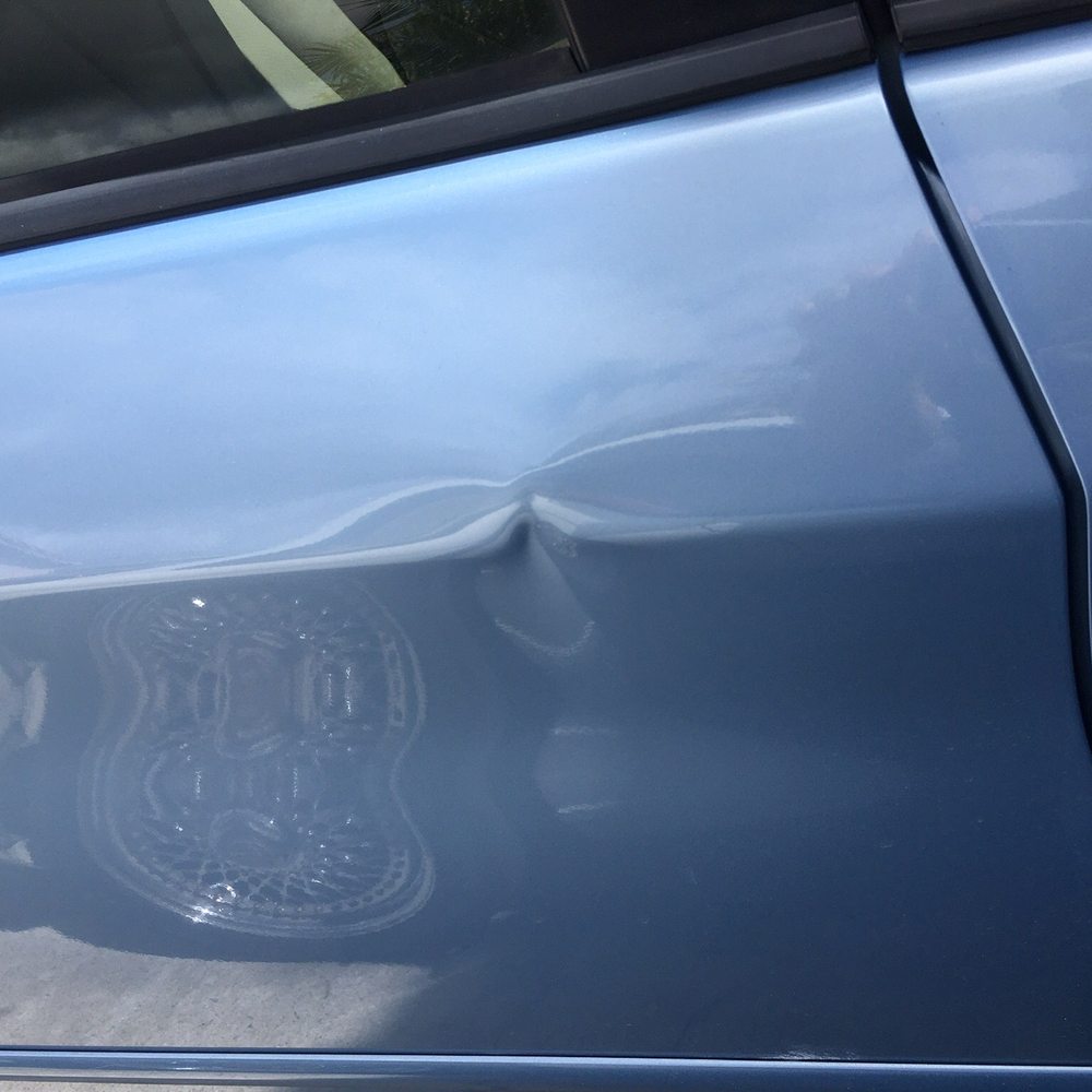 The Disappearing Dent - Car door dent. - Mobile Dent Repair Near Me The Disappearing Dent - Car door dent. - Mobile Dent Repair Near Me