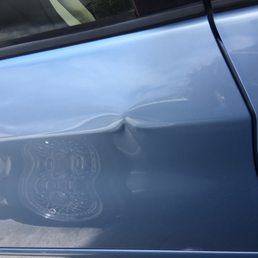 Car door dent. Car door dent.