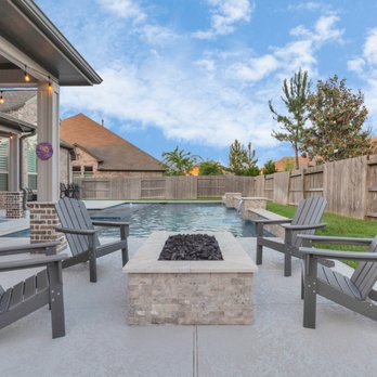 Island Life Pools & Patios - a patio with a fire pit - Pool & Hot Tub Service Near Me - Cypress, Texas Island Life Pools & Patios - a patio with a fire pit - Pool & Hot Tub Service Near Me - Cypress, Texas