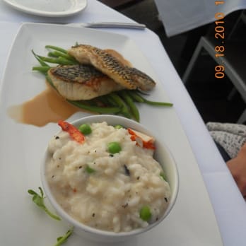Pacifica Del Mar - Cast iron Seared Barramundi black truffle risotto, haricot verts, lobster reduction 28 - New American Near Me - Del Mar, California Pacifica Del Mar - Cast iron Seared Barramundi black truffle risotto, haricot verts, lobster reduction 28 - New American Near Me - Del Mar, California