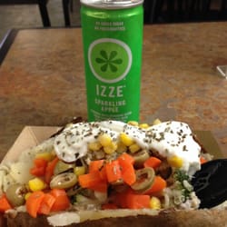 Mr. Potato King - Delicious potato! It's filled with butter and cheese mashed potatoes, homemade tzatziki, chicken, & fresh veggies galore.