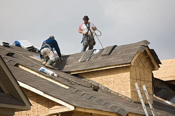 Slide of Camelot Roofing