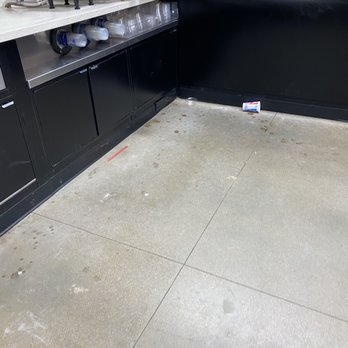 Stop N Save - Cups and trash all over the floor - Gas Stations Near Me - Erie, Colorado