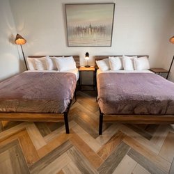 Room 14, has 2 queen beds