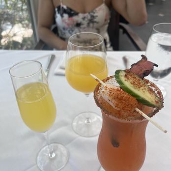 Americana - Her bottomless mimosa and my michelada. - New American Near Me - Las Vegas, Nevada