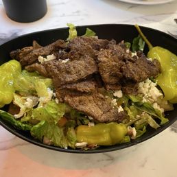House salad with lamb and beef shawarma House salad with lamb and beef shawarma