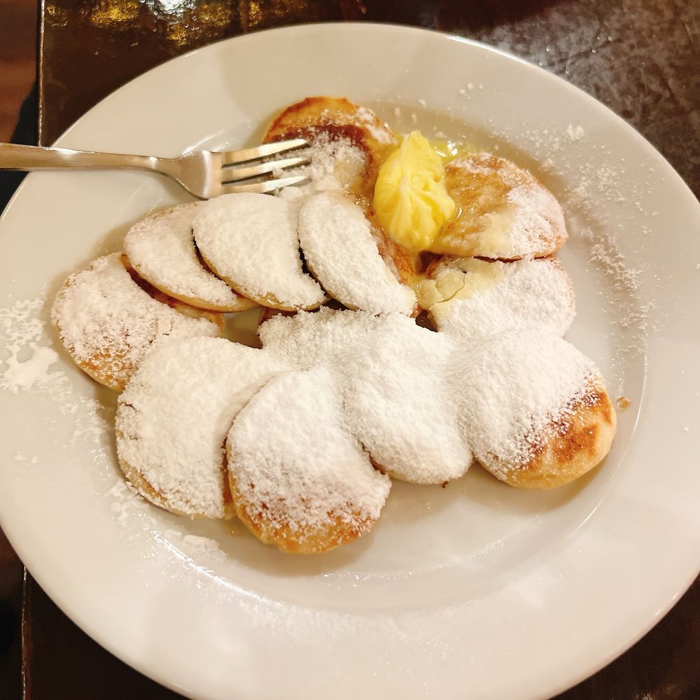 The Pantry - Poffertjes (Mini pancakes served with butter and powdered sugar) - Modern European Near Me - Amsterdam, New Hampshire The Pantry - Poffertjes (Mini pancakes served with butter and powdered sugar) - Modern European Near Me - Amsterdam, New Hampshire