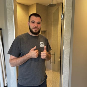 Bloomfield Construction & Restoration - Nick from the crew delivering the finished product! - Roofing Near Me - Bloomfield Hills, Michigan Bloomfield Construction & Restoration - Nick from the crew delivering the finished product! - Roofing Near Me - Bloomfield Hills, Michigan