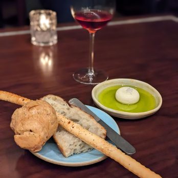 Yolan - Bread, olive oil and butter - Italian Near Me - Nashville, Tennessee Yolan - Bread, olive oil and butter - Italian Near Me - Nashville, Tennessee