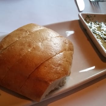 Bonefish Grill - Fresh baked bread with Olive oil and pesto - Seafood Near Me - Fairfax, Virginia Bonefish Grill - Fresh baked bread with Olive oil and pesto - Seafood Near Me - Fairfax, Virginia