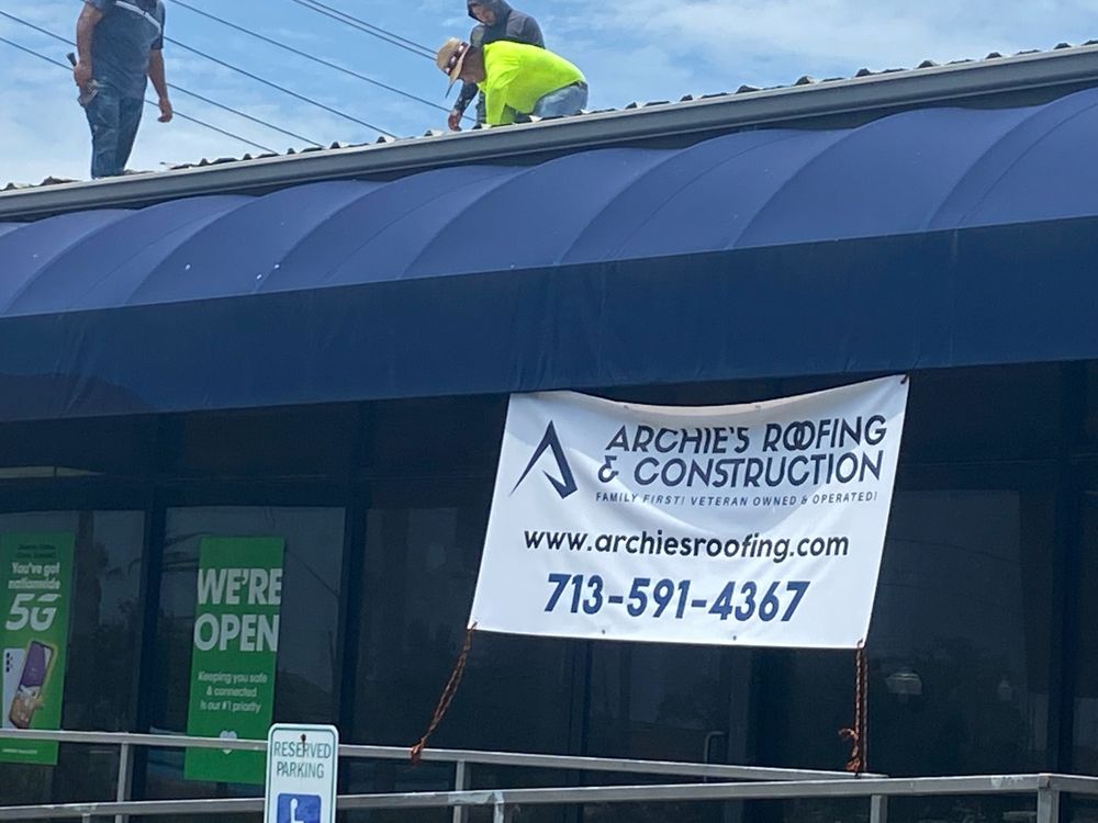 Slide of Archie's Roofing & Construction