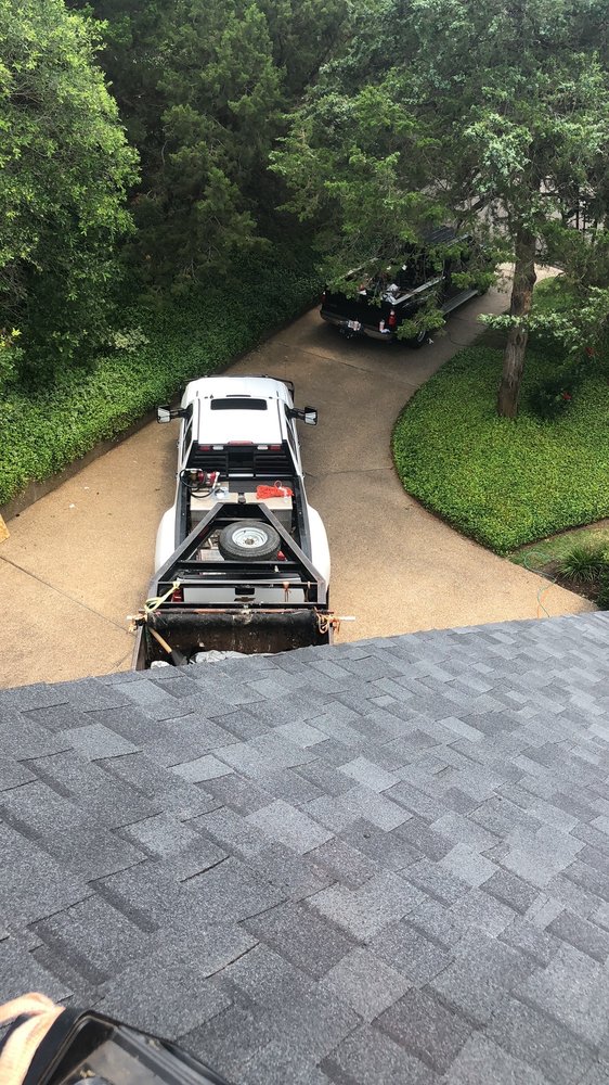 Slide of Erik's Roofing