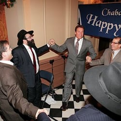Chabad of Sacramento - Rabbi Cohen with Governor Arnold Schwarzenegger during 2009 Chanukah