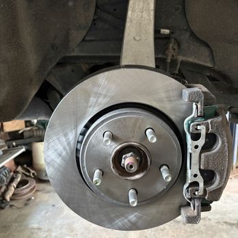 Pitcrew Auto - Brake pads and rotors being replaced - Auto Repair Near Me