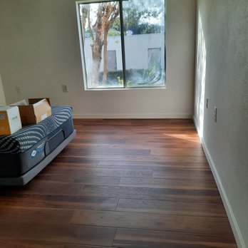 National Flooring Outlet - a living room with hardwood floors - Building Supplies Near Me - Monrovia, California National Flooring Outlet - a living room with hardwood floors - Building Supplies Near Me - Monrovia, California