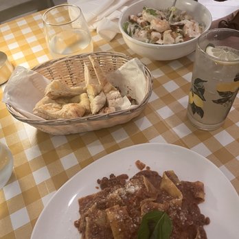 Limoncello - Bolognese pasta and shrimp Caesar salad - Italian Near Me - Miami Beach, Florida