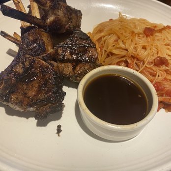 Carrabba's Italian Grill - Tuscan lamb chops with Angel hair pasta with pomodoro sauce - Italian Near Me - Baton Rouge, Louisiana Carrabba's Italian Grill - Tuscan lamb chops with Angel hair pasta with pomodoro sauce - Italian Near Me - Baton Rouge, Louisiana