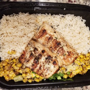 California Fish Grill - Mahi Mahi (Grilled fish) with Garlic butter sauce, Fire roasted corn, White rice. - Seafood Near Me - Upland, California California Fish Grill - Mahi Mahi (Grilled fish) with Garlic butter sauce, Fire roasted corn, White rice. - Seafood Near Me - Upland, California
