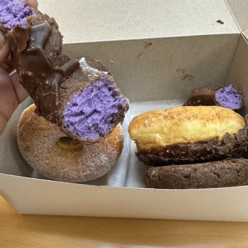 Bigworm's Bakery & Deli - Purple 'ube' yam makes a super moist donut. They go fast so don't be sorry. - Delis Near Me - Stockton, California Bigworm's Bakery & Deli - Purple 'ube' yam makes a super moist donut. They go fast so don't be sorry. - Delis Near Me - Stockton, California