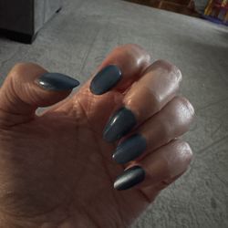 Victoria's Nails and Wax - GelX with blue cats eye.