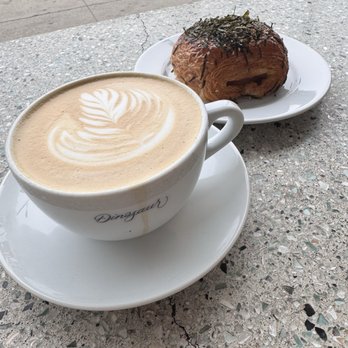 Dinosaur Coffee - Caramel latte with spam musubi croissant - Coffee & Tea Near Me - Los Angeles, California Dinosaur Coffee - Caramel latte with spam musubi croissant - Coffee & Tea Near Me - Los Angeles, California