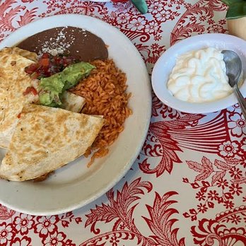 The fajita quesadilla with beans, rice, gucamole, rice, and a whole lot of sour cream.