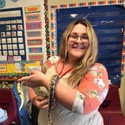 Learning Tree Preschool - Teacher Courtney teaching the children about snakes