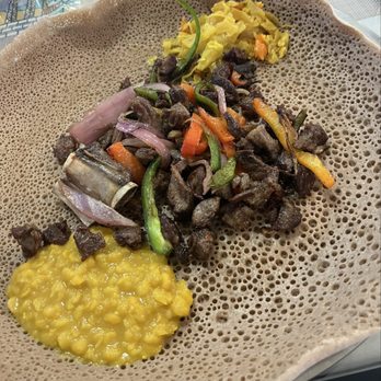 Abyssinia Ethiopian Restaurant - Tibs Lamb with Tikel Gomen and Yemisir Keyi Wett - Ethiopian Near Me - Indianapolis, Indiana Abyssinia Ethiopian Restaurant - Tibs Lamb with Tikel Gomen and Yemisir Keyi Wett - Ethiopian Near Me - Indianapolis, Indiana