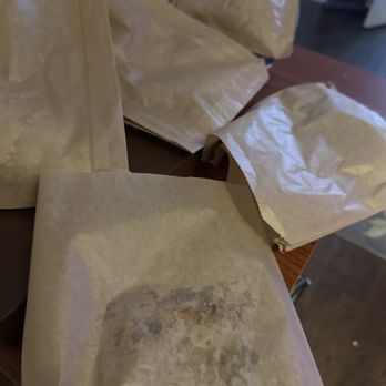 Bien Cuit - Paper stuck hard on pastry (plus other smushed pastries in the back) - Bakeries Near Me - Brooklyn, New York