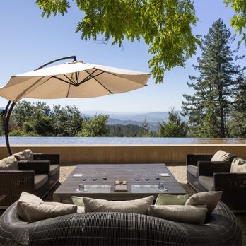 CADE Estate Winery - outdoor seating area overlooking pool - Wine Tasting Room Near Me - Angwin, California CADE Estate Winery - outdoor seating area overlooking pool - Wine Tasting Room Near Me - Angwin, California