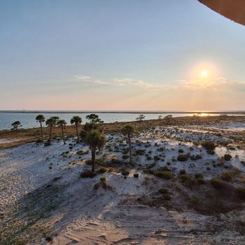 Pirate's Bar and Grill - Waiting on a table on Friday at 6:00 PM. No worries, enjoying the view on the outside deck. - American Near Me - Dauphin Island, Alabama