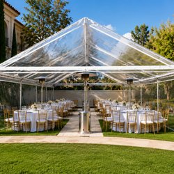 Tlapazola Event Rentals - Clear-top tent rental with tables, chairs and event setup for an outdoor celebration in Los Angeles.