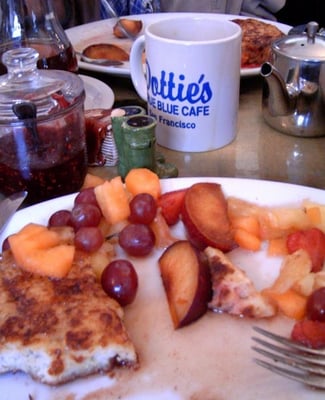 Photo of Dottie's True Blue Cafe - San Francisco, CA, US. "Alabama Summer" french toast w/ fruit... what's left of it, anyway