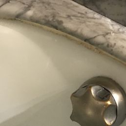 Caulking on bathtub