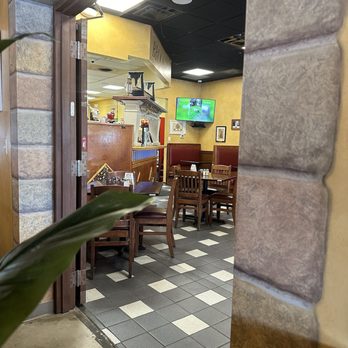 Capriccios Italian Restaurant - A little peekaboo of the cashier area - Italian Near Me - Richmond, Virginia Capriccios Italian Restaurant - A little peekaboo of the cashier area - Italian Near Me - Richmond, Virginia