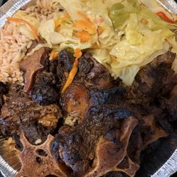 West Indies Natural Food - Large oxtail over rice & peas with steamed vegetables