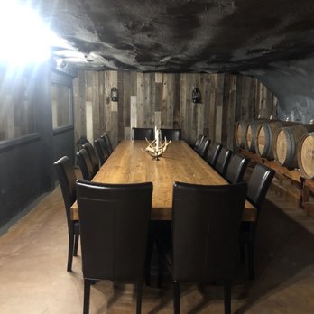 Augustino Estate & Vineyard - a long table in a wine cellar - Wineries Near Me - Grants Pass, Oregon Augustino Estate & Vineyard - a long table in a wine cellar - Wineries Near Me - Grants Pass, Oregon