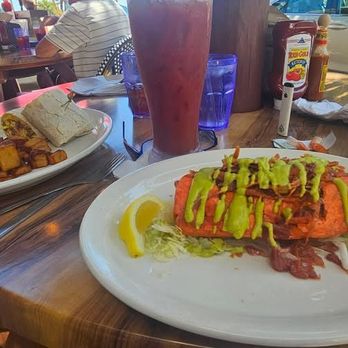 Mulligan's Beach House Bar & Grill - Breakfast burrito egg sausage/potatoes Crispy Ahi tuna roll with wasabi - American Near Me - Jensen Beach, Florida