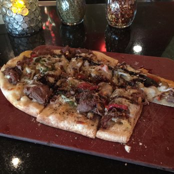 Naples Flatbread Kitchen & Bar - Bisteca Flat bread (bar portion) - Pizza Near Me - Estero, Florida Naples Flatbread Kitchen & Bar - Bisteca Flat bread (bar portion) - Pizza Near Me - Estero, Florida