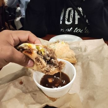 Cosmopolitan Tavern - Philly cheese steak with au ju sauce - Cocktail Bars Near Me - Fresno, California