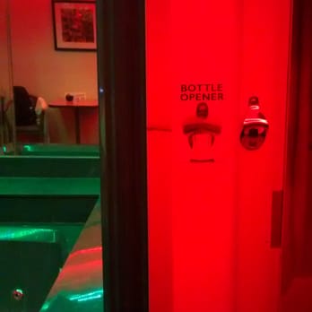 Pelham Garden Motel - convenient bottle opener outside bathroom door-shown with accent lighting on at night - Hotels Near Me - Bronx, New York Pelham Garden Motel - convenient bottle opener outside bathroom door-shown with accent lighting on at night - Hotels Near Me - Bronx, New York