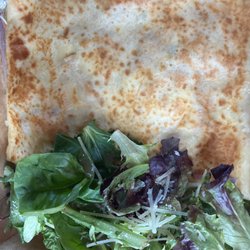La Crème Cafe - Napoleon crêpe (lox, cream cheese, capers, onion, etc.), with a side salad.