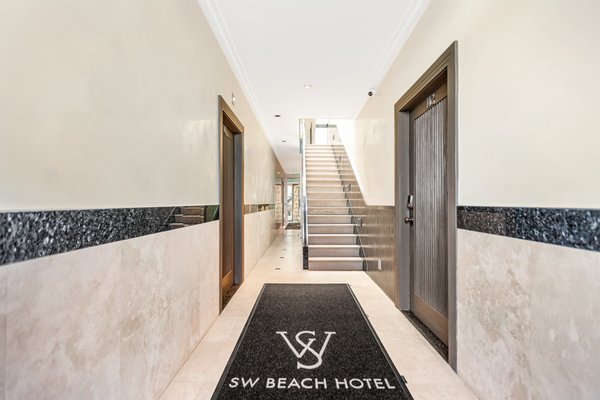 Amenities - Indulge in the perfect blend of comfort and convenience at SW Beach Hotel. Located within walking distance to coffee shops and gyms, and just steps away from the beach, you'll have everything you need for a relaxing and rejuvenating stay. Our rooms feature plush linens, luxurious robes and slippers, and a coffee maker to get your morning started right. You can also enjoy your favorite shows on the smart TV or easily access the room with keyless remote entry. Book your stay today and experience the ultimate in comfort and convenience.
Complimentary Wi-Fi
Smart TV
Keyless Remote Entry
Air Conditioning
Refrigerator
Coffee Machines with cream and Sugar
Blackout Curtains
Luxury Hotel Robes
Slippers Amenities - Indulge in the perfect blend of comfort and convenience at SW Beach Hotel. Located within walking distance to coffee shops and gyms, and just steps away from the beach, you'll have everything you need for a relaxing and rejuvenating stay. Our rooms feature plush linens, luxurious robes and slippers, and a coffee maker to get your morning started right. You can also enjoy your favorite shows on the smart TV or easily access the room with keyless remote entry. Book your stay today and experience the ultimate in comfort and convenience.
Complimentary Wi-Fi
Smart TV
Keyless Remote Entry
Air Conditioning
Refrigerator
Coffee Machines with cream and Sugar
Blackout Curtains
Luxury Hotel Robes
Slippers