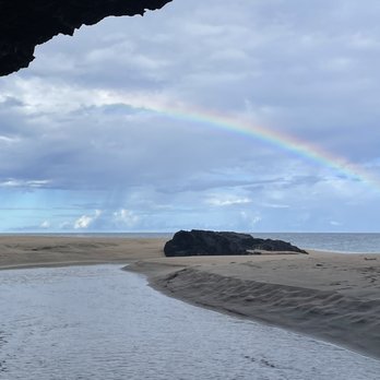 Kalalau Trail - There is a cool cave at the beach at mile 2, you need to go around the corner to the left to find it. - Hiking Near Me - Hanalei, Hawaii Kalalau Trail - There is a cool cave at the beach at mile 2, you need to go around the corner to the left to find it. - Hiking Near Me - Hanalei, Hawaii
