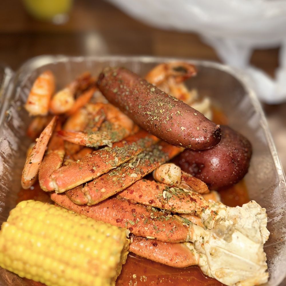 Lotus Seafood - crab legs, corn on the cob, and sausage - Seafood Near Me - Houston, Texas Lotus Seafood - crab legs, corn on the cob, and sausage - Seafood Near Me - Houston, Texas