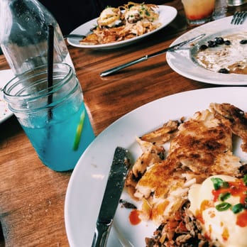 Iron Rooster - brisket benny (foreground - added sriracha to it myself) and the iron benny (background) - American Near Me - Baltimore, Maryland