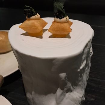 Stubborn Seed - Caviar on potato puffs with creme fresh. Perfect amuse bouche on NYE! - New American Near Me - Miami Beach, Florida