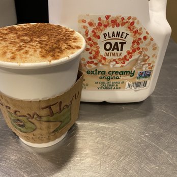 BeanThru - a cup of coffee next to a container of oat milk - Cafes Near Me - Wexford, Pennsylvania BeanThru - a cup of coffee next to a container of oat milk - Cafes Near Me - Wexford, Pennsylvania