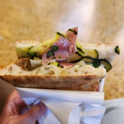 La Boccaccia - Zucchini and prosciutto pizza, folded to-go